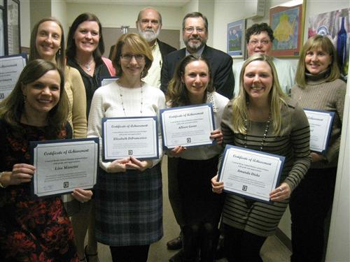 Candidates being recognized by school board. 