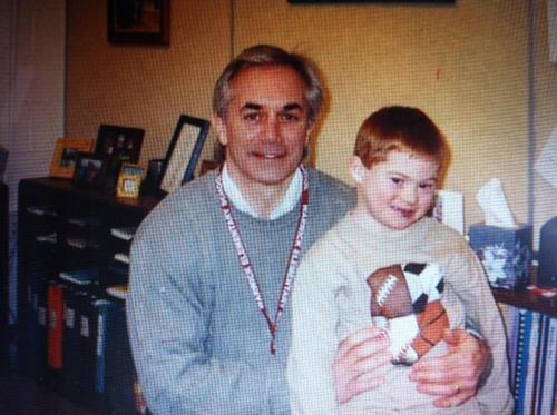 Principal Weitzel with student 