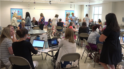 teachers meet at Mill Creek Elementary School 