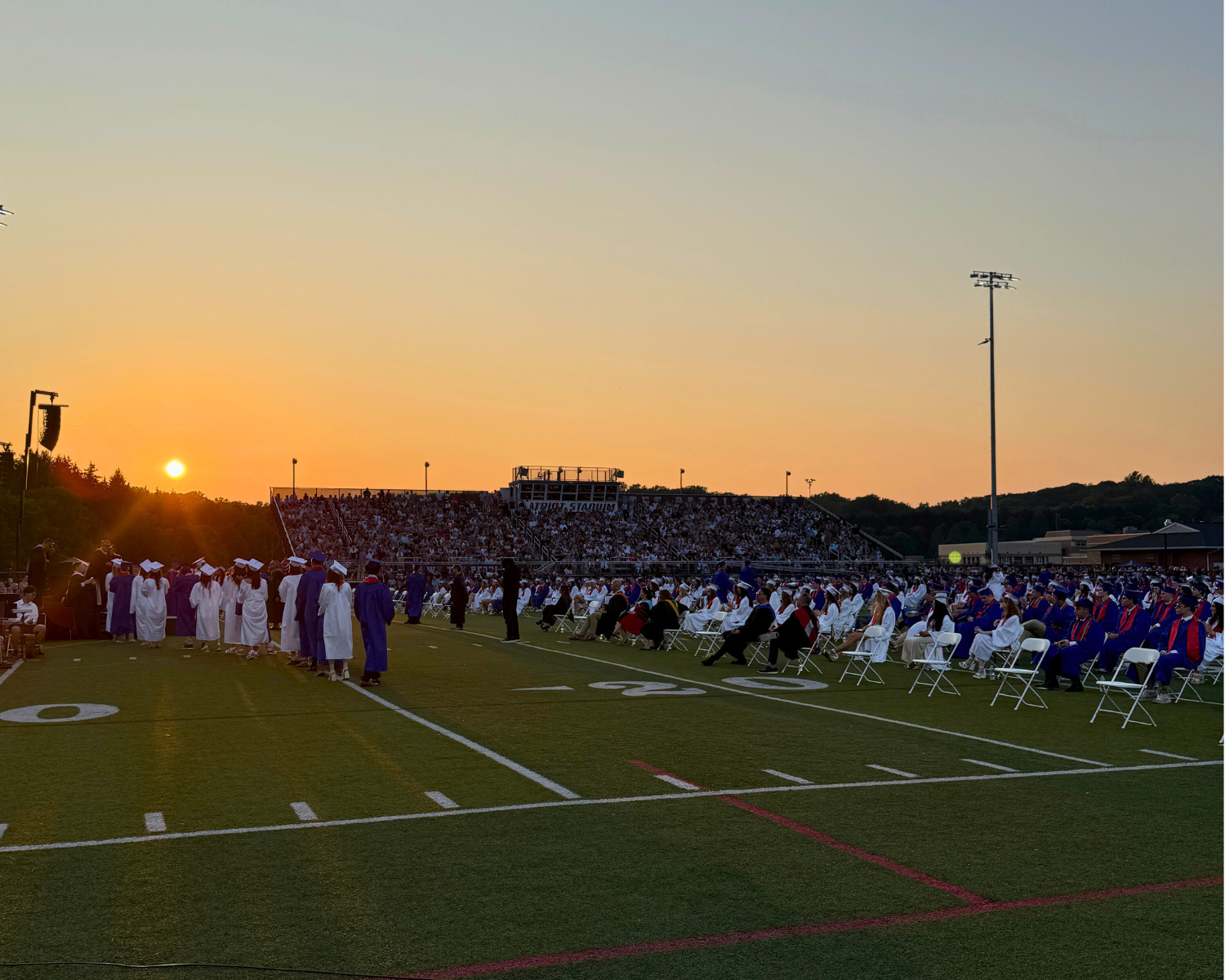 The sun sets over the CB East graduation